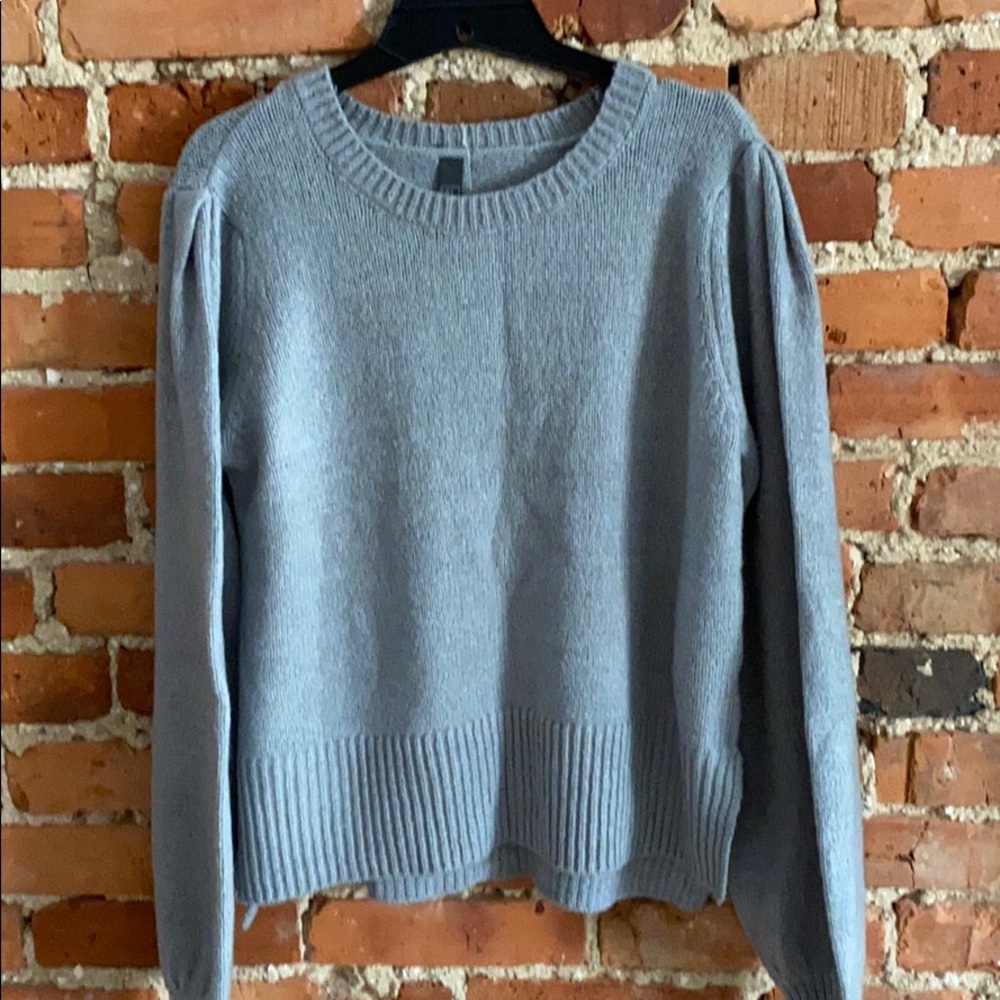 Sweater with bell sleeves and buttons on back